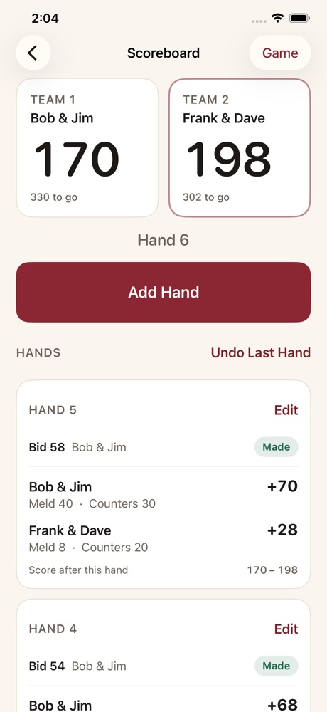 The PinScore scoreboard, showing both teams&rsquo; totals in large type above the hand-by-hand score sheet